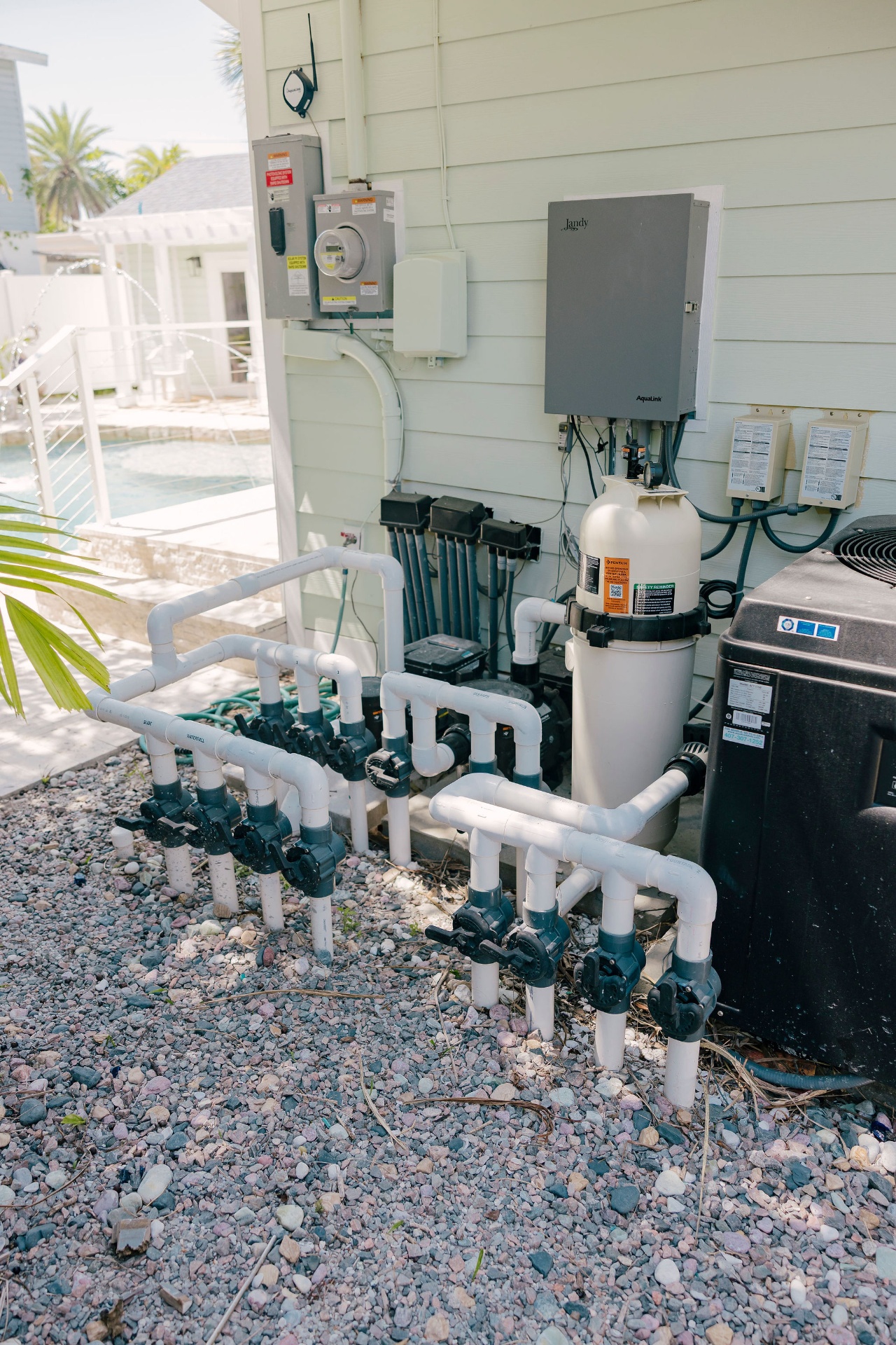 Pool equipment pad with automation, filtration, and heating system